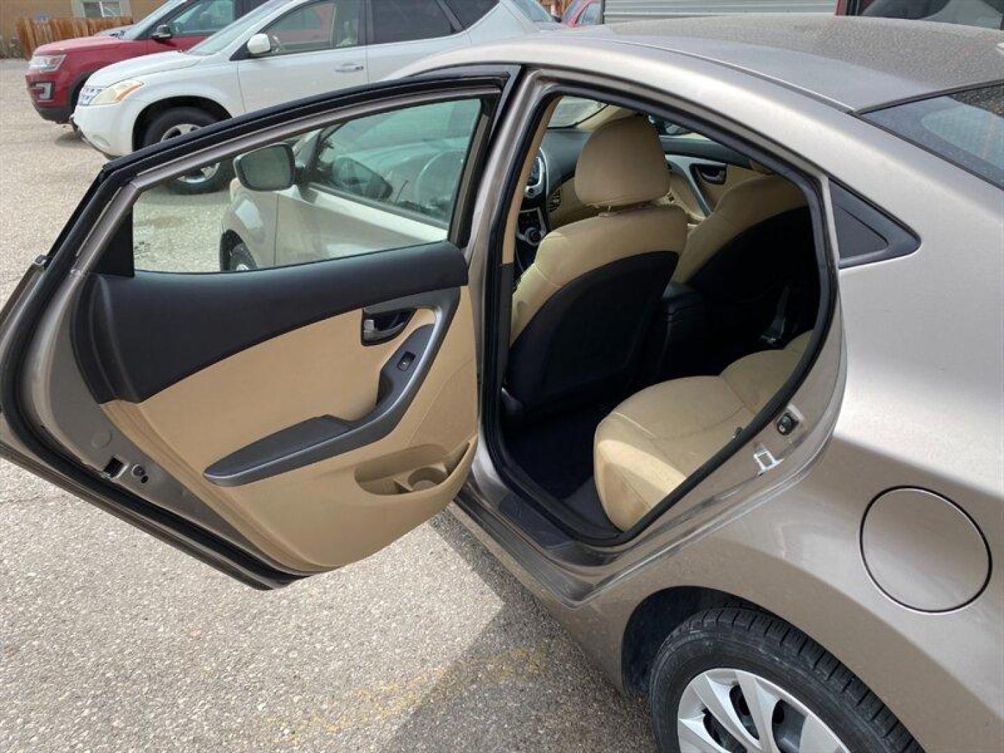 2011 Tan Hyundai ELANTRA GLS (5NPDH4AE5BH) with an 1.8L I4 148hp 131ft. lbs. engine, 6 Speed Manual transmission, located at 842 E South Street, Powell, WY, 82435, (307) 754-7289, 44.752300, -108.746933 - Photo#9