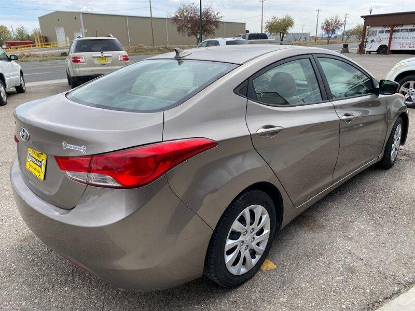 2011 Tan Hyundai ELANTRA GLS (5NPDH4AE5BH) with an 1.8L I4 148hp 131ft. lbs. engine, 6 Speed Manual transmission, located at 842 E South Street, Powell, WY, 82435, (307) 754-7289, 44.752300, -108.746933 - Photo#2