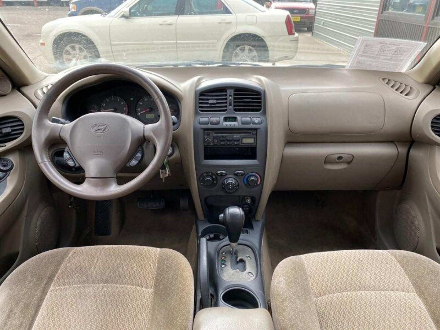 2003 Gold Hyundai SANTA FE (KM8SB12BX3U) with an 2.4L I4 138hp 147ft. lbs. engine, 5 Speed Manual transmission, located at 842 E South Street, Powell, WY, 82435, (307) 754-7289, 44.752300, -108.746933 - Photo#10