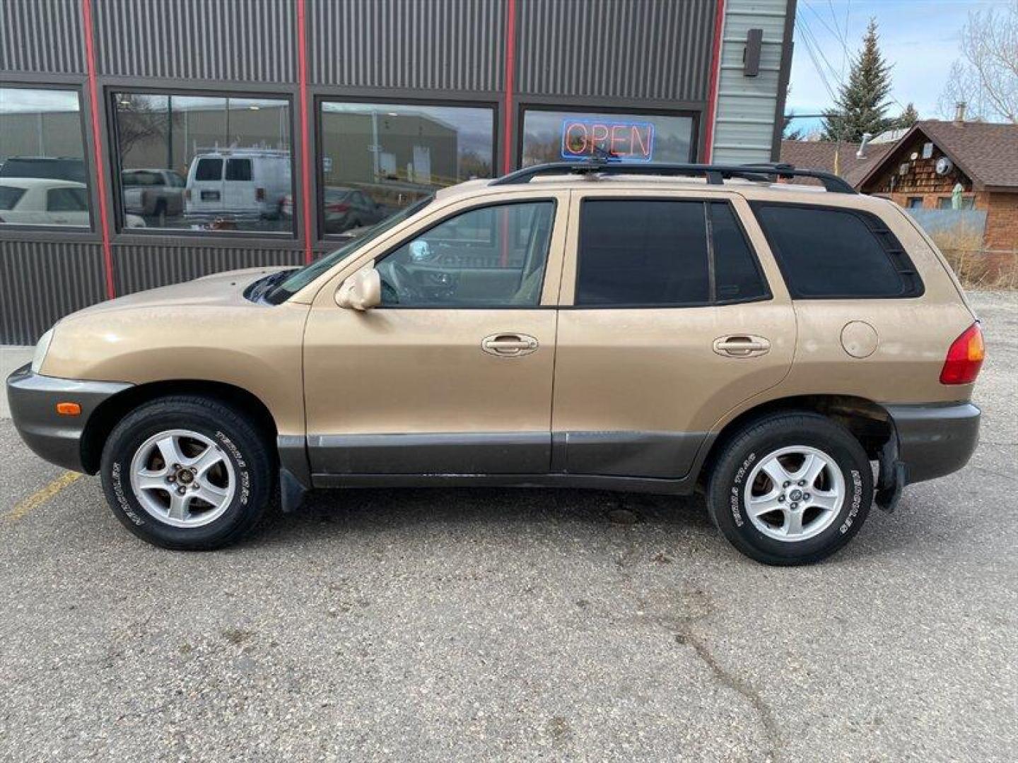 2003 Gold Hyundai SANTA FE (KM8SB12BX3U) with an 2.4L I4 138hp 147ft. lbs. engine, 5 Speed Manual transmission, located at 842 E South Street, Powell, WY, 82435, (307) 754-7289, 44.752300, -108.746933 - Photo#27