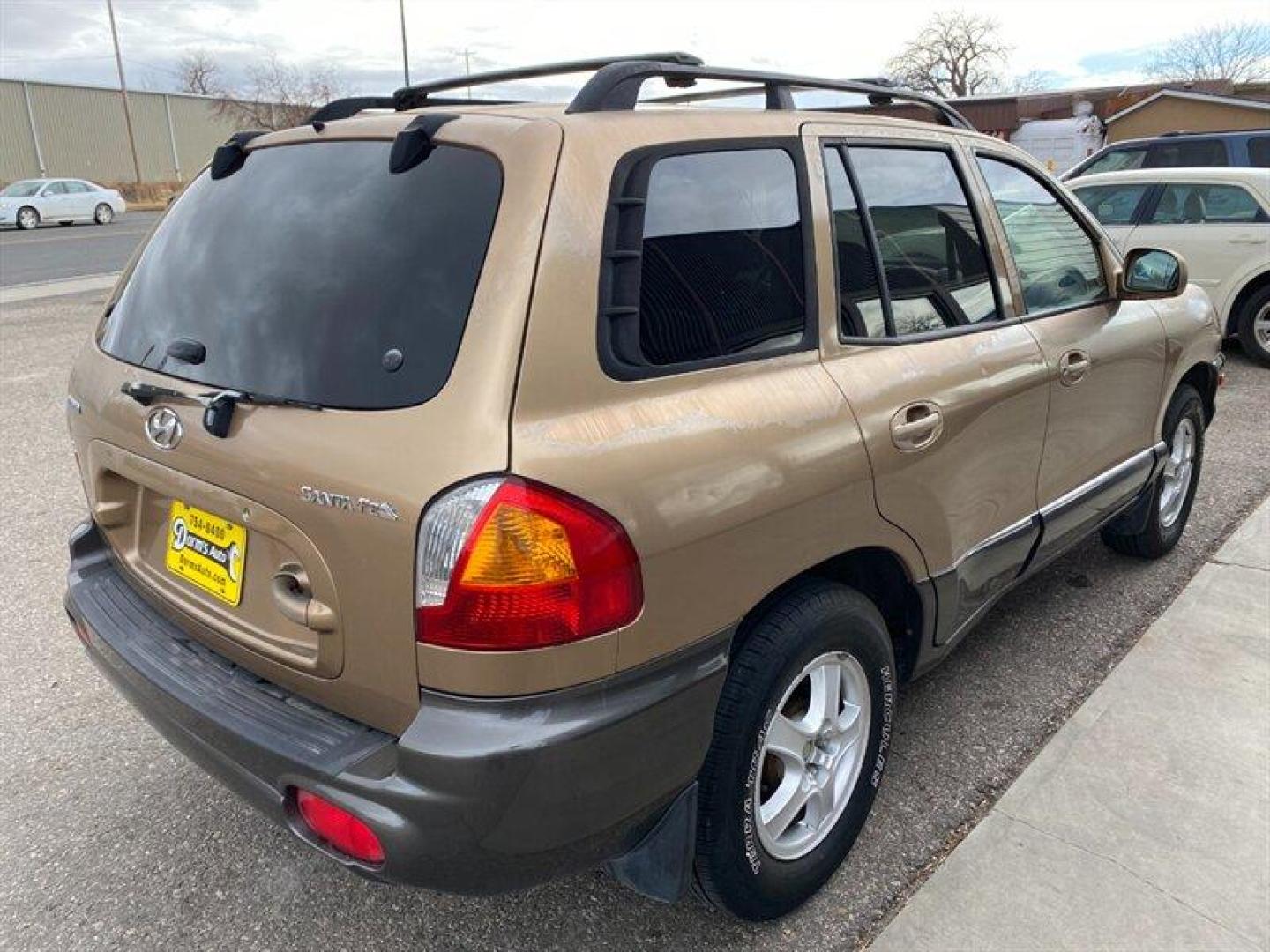 2003 Gold Hyundai SANTA FE (KM8SB12BX3U) with an 2.4L I4 138hp 147ft. lbs. engine, 5 Speed Manual transmission, located at 842 E South Street, Powell, WY, 82435, (307) 754-7289, 44.752300, -108.746933 - Photo#2