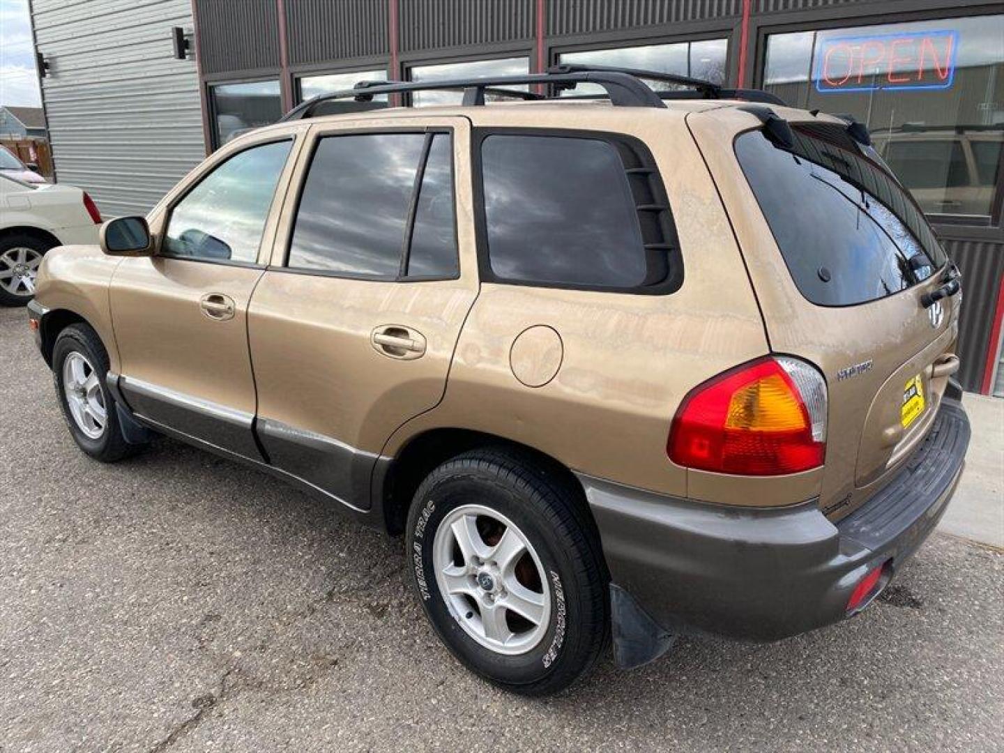 2003 Gold Hyundai SANTA FE (KM8SB12BX3U) with an 2.4L I4 138hp 147ft. lbs. engine, 5 Speed Manual transmission, located at 842 E South Street, Powell, WY, 82435, (307) 754-7289, 44.752300, -108.746933 - Photo#3