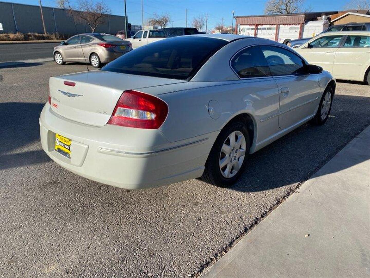 2003 Satin White Pearlcoat Chrysler Sebring LX (4C3AG42G73E) with an 2L NA I4 single overhead cam (SOHC) 16V engine, Automatic transmission, located at 842 E South Street, Powell, WY, 82435, (307) 754-7289, 44.752300, -108.746933 - Photo#20