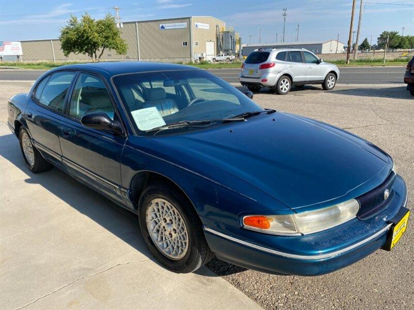 1997 Blue Chrysler LHS (2C3HC56F6VH) with an 3.5L V6 engine, Automatic transmission, located at 842 E South Street, Powell, WY, 82435, (307) 754-7289, 44.752300, -108.746933 - Photo#1