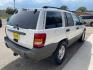 2000 Stone White Clearcoat Jeep Grand Cherokee Laredo (1J4G248S4YC) with an 4.0L I6 195hp 230ft. lbs. engine, Automatic transmission, located at 842 E South Street, Powell, WY, 82435, (307) 754-7289, 44.752300, -108.746933 - Photo#2