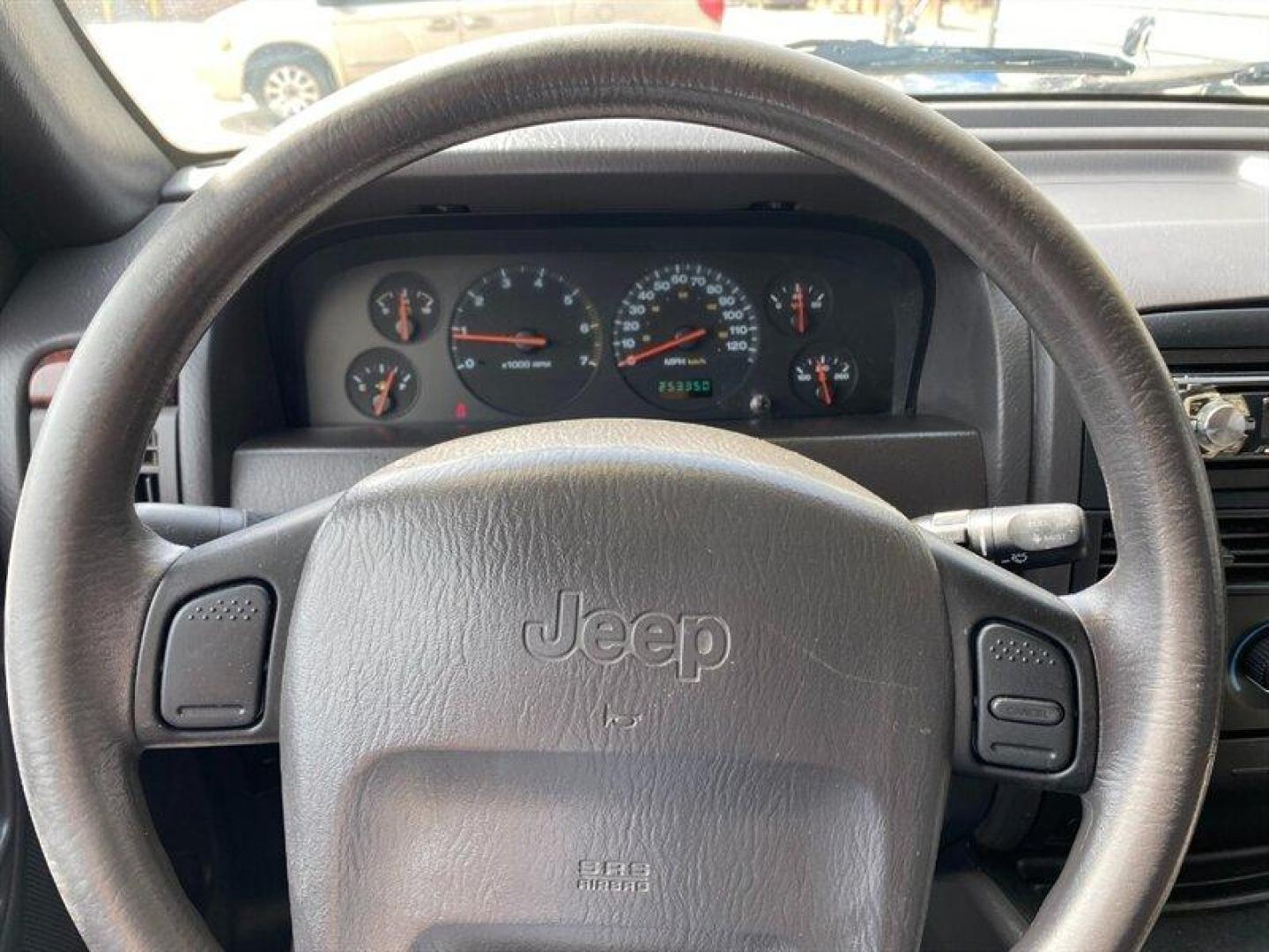 2000 Stone White Clearcoat Jeep Grand Cherokee Laredo (1J4G248S4YC) with an 4.0L I6 195hp 230ft. lbs. engine, Automatic transmission, located at 842 E South Street, Powell, WY, 82435, (307) 754-7289, 44.752300, -108.746933 - Photo#8