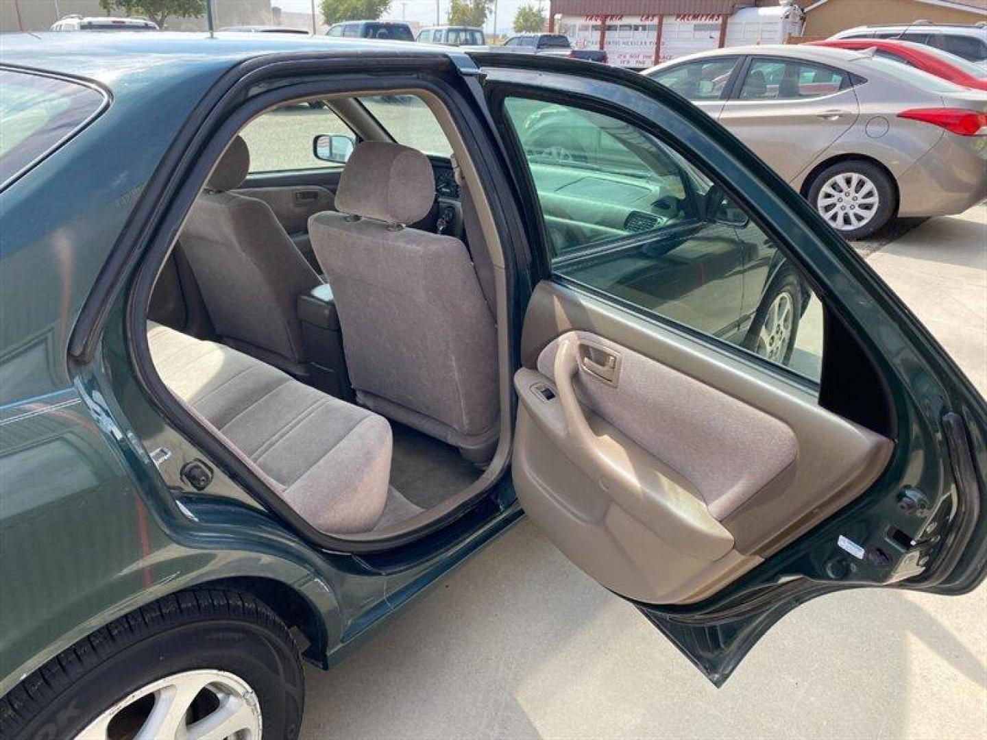 1999 Green Toyota Camry LE V6 (JT2BF28K7X0) with an 3.0L NA V6 double overhead cam (DOHC) 24V engine, Automatic transmission, located at 842 E South Street, Powell, WY, 82435, (307) 754-7289, 44.752300, -108.746933 - Photo#14