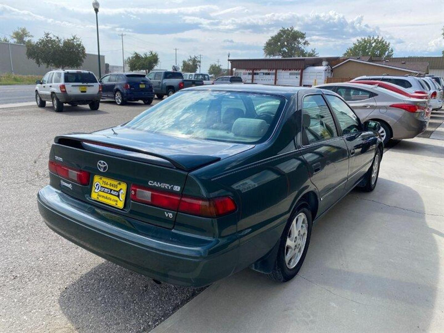 1999 Green Toyota Camry LE V6 (JT2BF28K7X0) with an 3.0L NA V6 double overhead cam (DOHC) 24V engine, Automatic transmission, located at 842 E South Street, Powell, WY, 82435, (307) 754-7289, 44.752300, -108.746933 - Photo#2