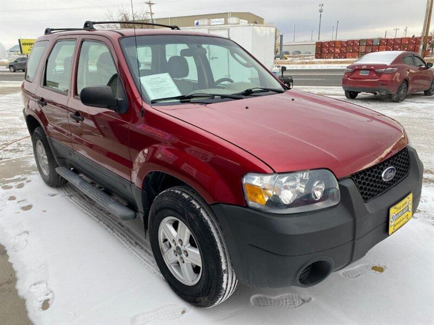 2007 Red Ford Escape XLS (1FMYU92Z17K) with an 2.3L inline 4 double overhead camshaft 16V engine, 5 Speed Manual transmission, located at 842 E South Street, Powell, WY, 82435, (307) 754-7289, 44.752300, -108.746933 - Photo#1