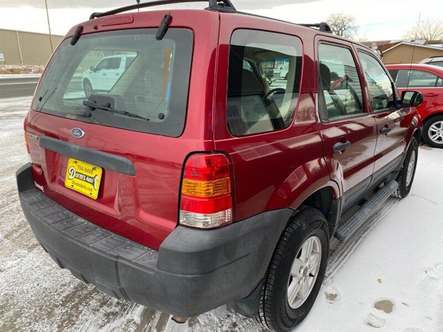 2007 Red Ford Escape XLS (1FMYU92Z17K) with an 2.3L inline 4 double overhead camshaft 16V engine, 5 Speed Manual transmission, located at 842 E South Street, Powell, WY, 82435, (307) 754-7289, 44.752300, -108.746933 - Photo#2