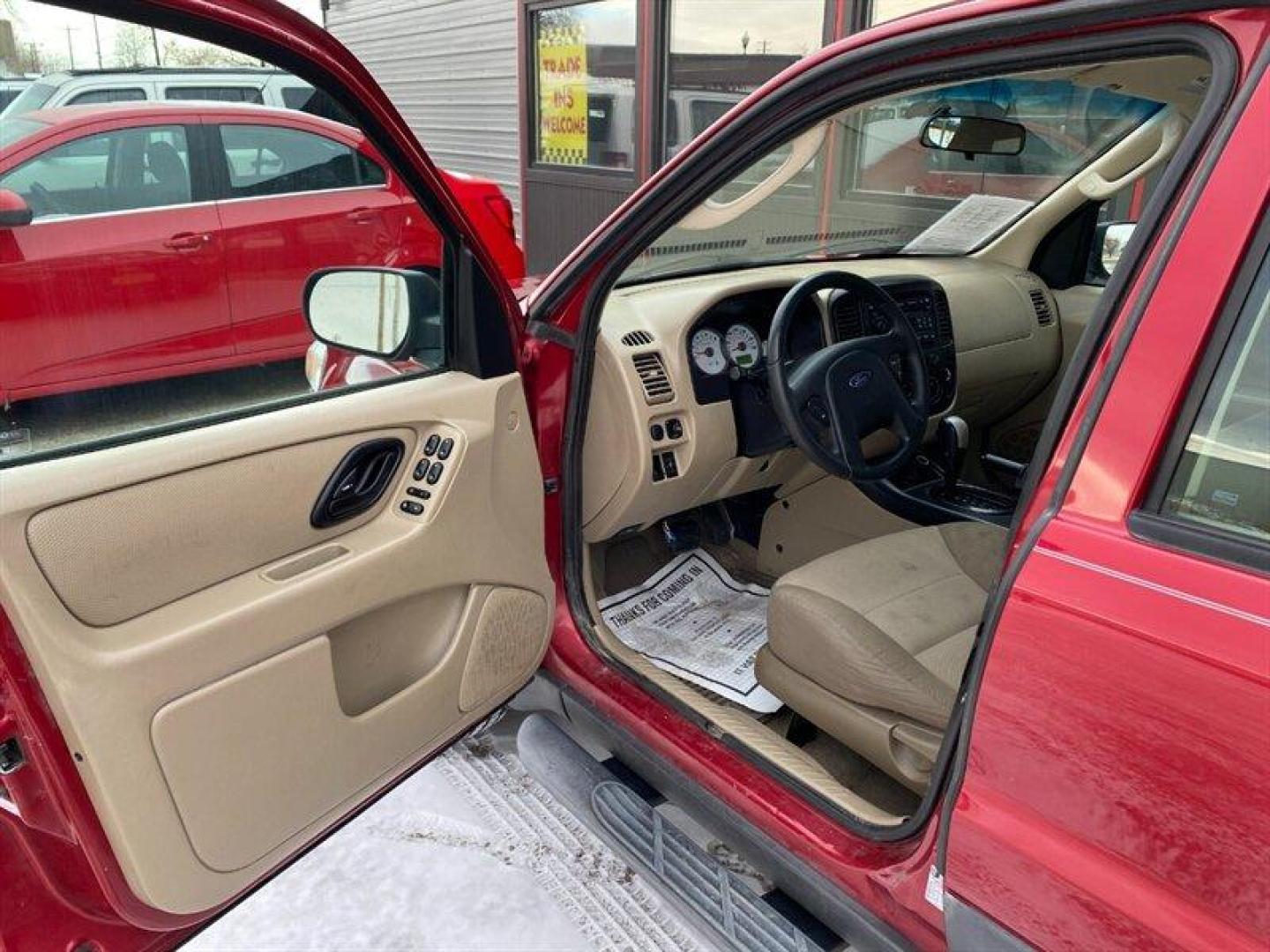 2007 Red Ford Escape XLS (1FMYU92Z17K) with an 2.3L inline 4 double overhead camshaft 16V engine, 5 Speed Manual transmission, located at 842 E South Street, Powell, WY, 82435, (307) 754-7289, 44.752300, -108.746933 - Photo#4