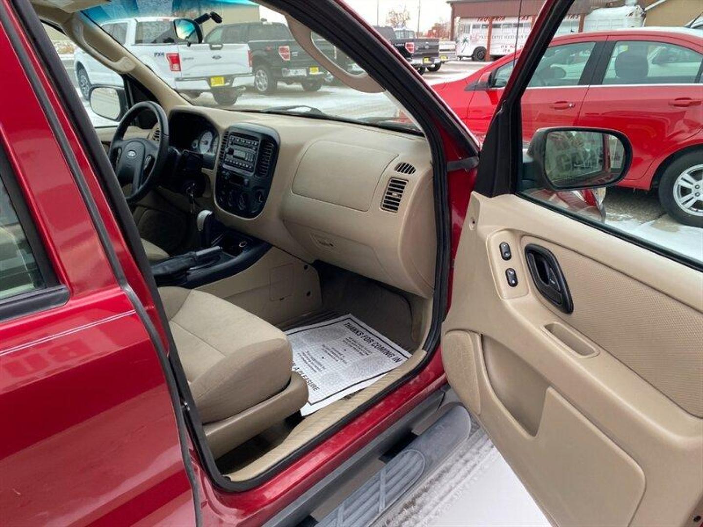 2007 Red Ford Escape XLS (1FMYU92Z17K) with an 2.3L inline 4 double overhead camshaft 16V engine, 5 Speed Manual transmission, located at 842 E South Street, Powell, WY, 82435, (307) 754-7289, 44.752300, -108.746933 - Photo#18