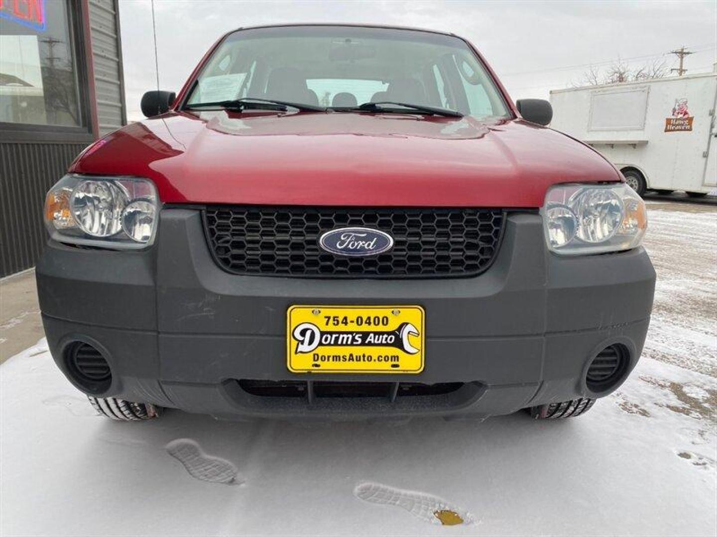 2007 Red Ford Escape XLS (1FMYU92Z17K) with an 2.3L inline 4 double overhead camshaft 16V engine, 5 Speed Manual transmission, located at 842 E South Street, Powell, WY, 82435, (307) 754-7289, 44.752300, -108.746933 - Photo#24